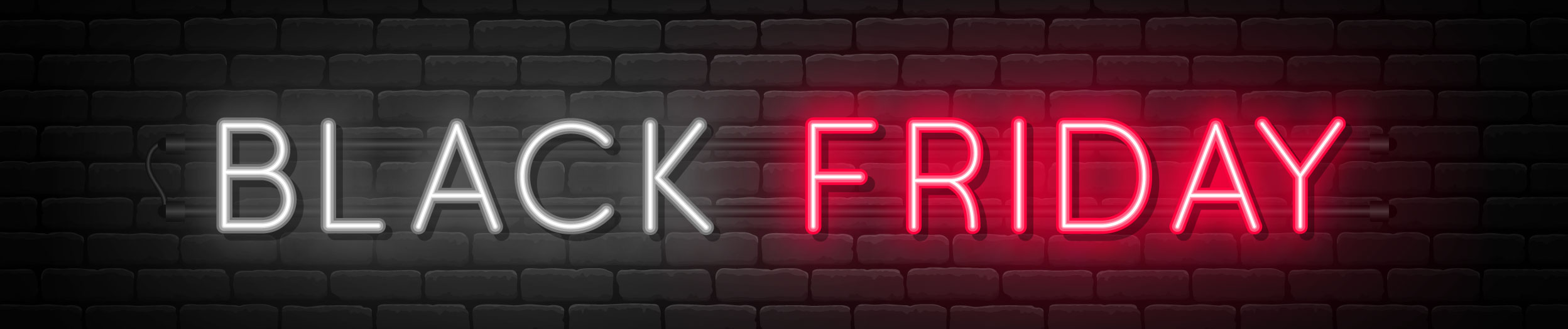 Enseigne néon « Black Friday » sur un mur de briques
